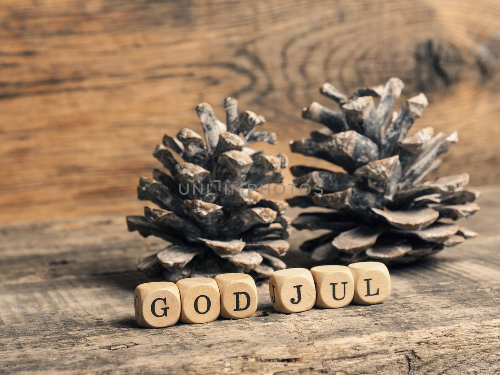 Scandinavian Merry Christmas with wooden blocks and the inscrption God Jul