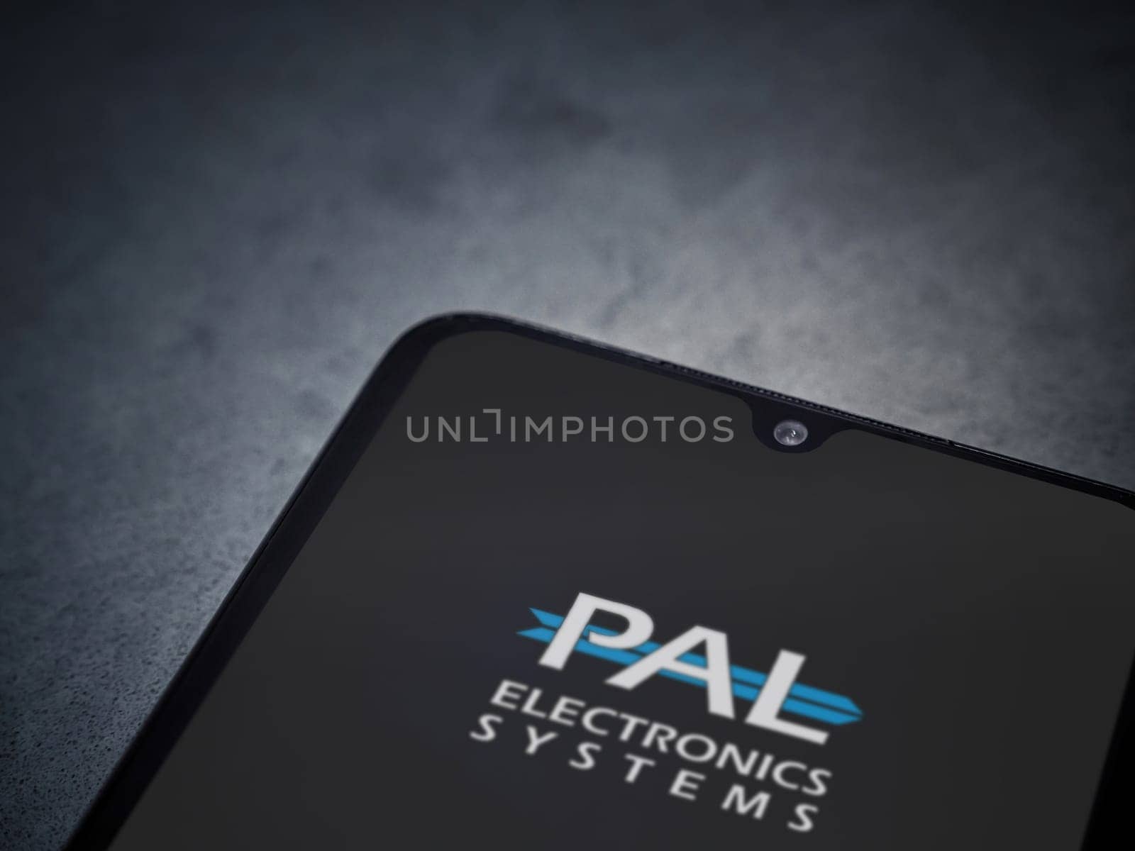 Lod, Israel - July 16,2023: PalGate app launch screen on smartphone on dark marble stone background. Top view flat lay with copy space.