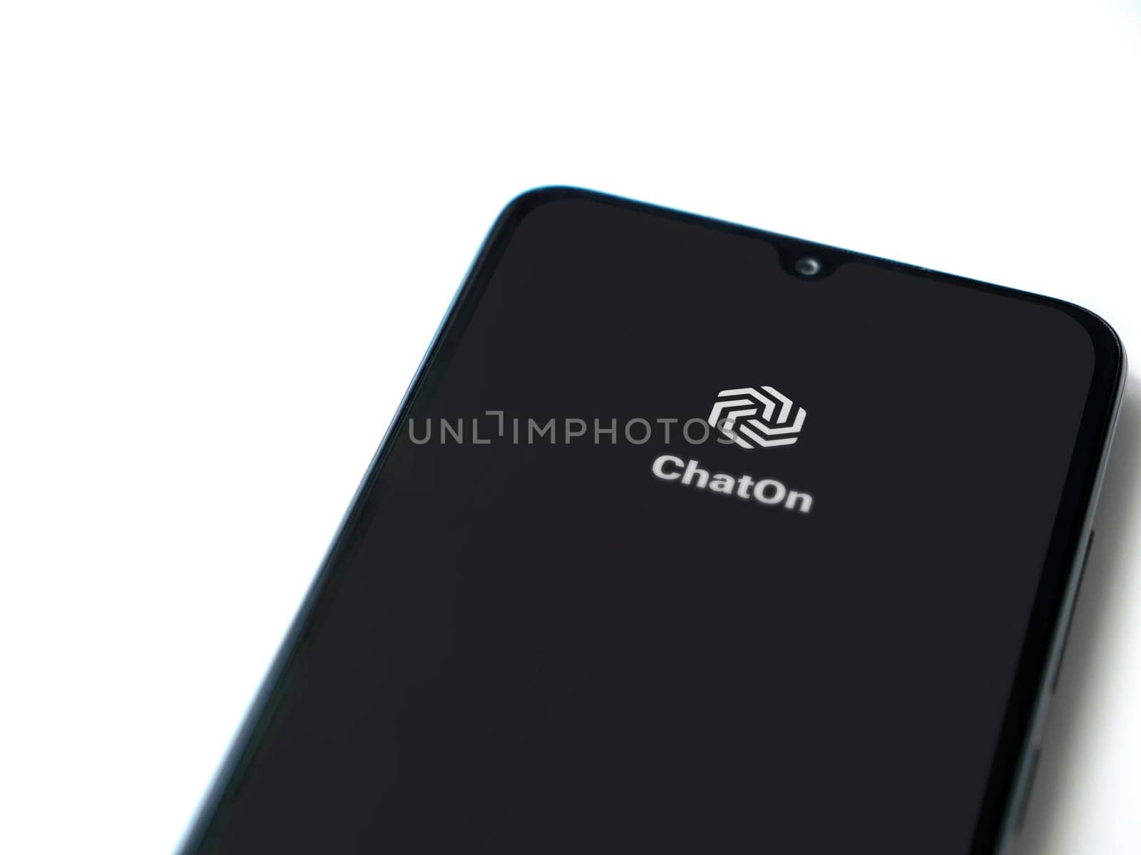 Lod, Israel - July 16,2023: ChatOn app launch screen on smartphone on white background. Top view flat lay with copy space.