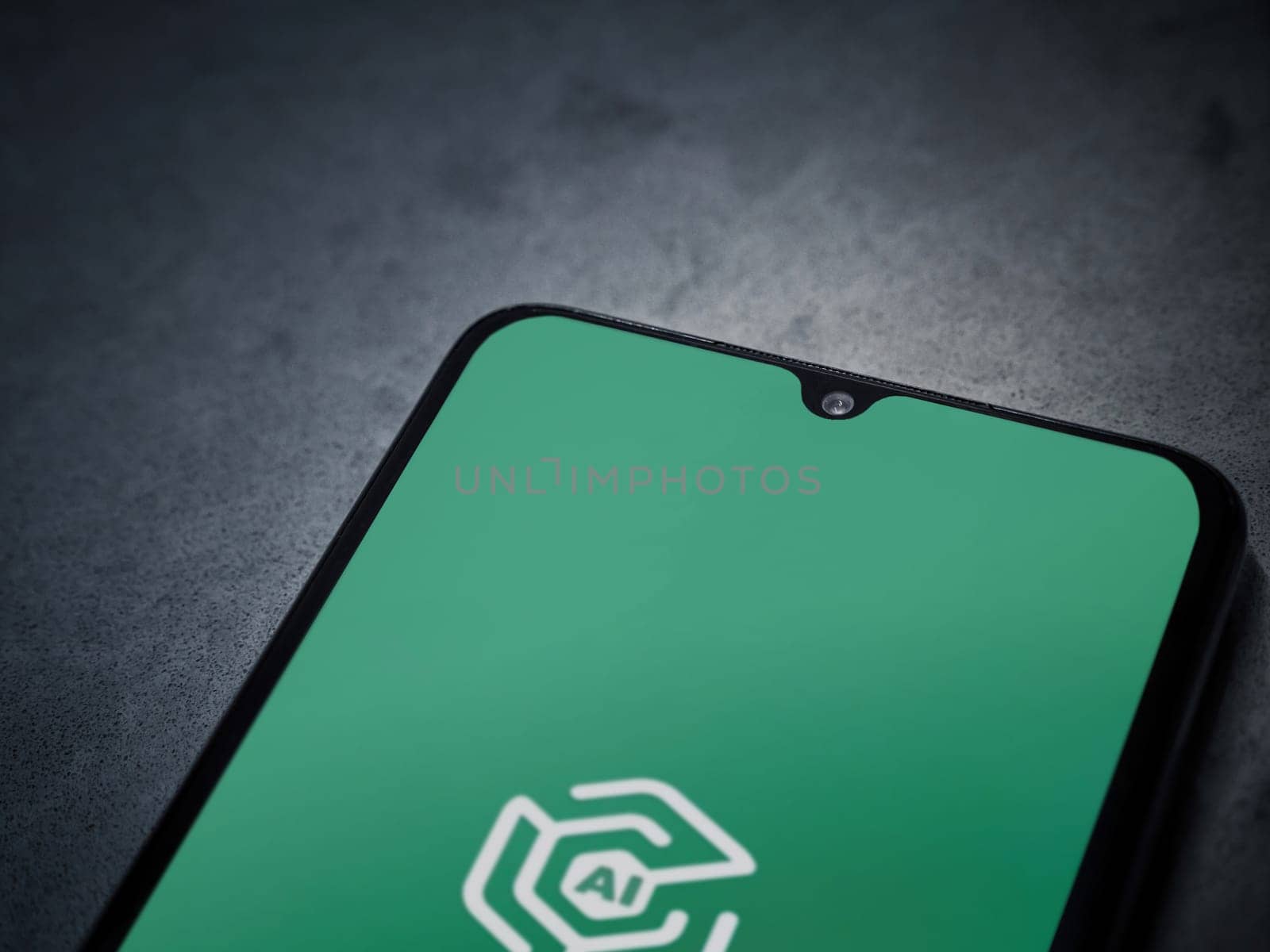 Lod, Israel - July 16,2023: Adam Ai app launch screen on smartphone on dark marble stone background. Top view flat lay with copy space.