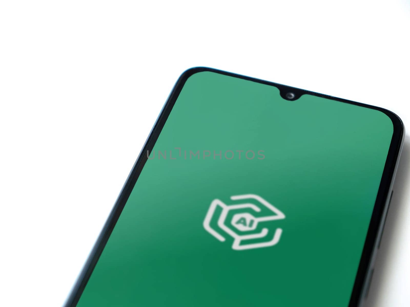 Lod, Israel - July 16,2023: Adam Ai app launch screen on smartphone on white background. Top view flat lay with copy space.