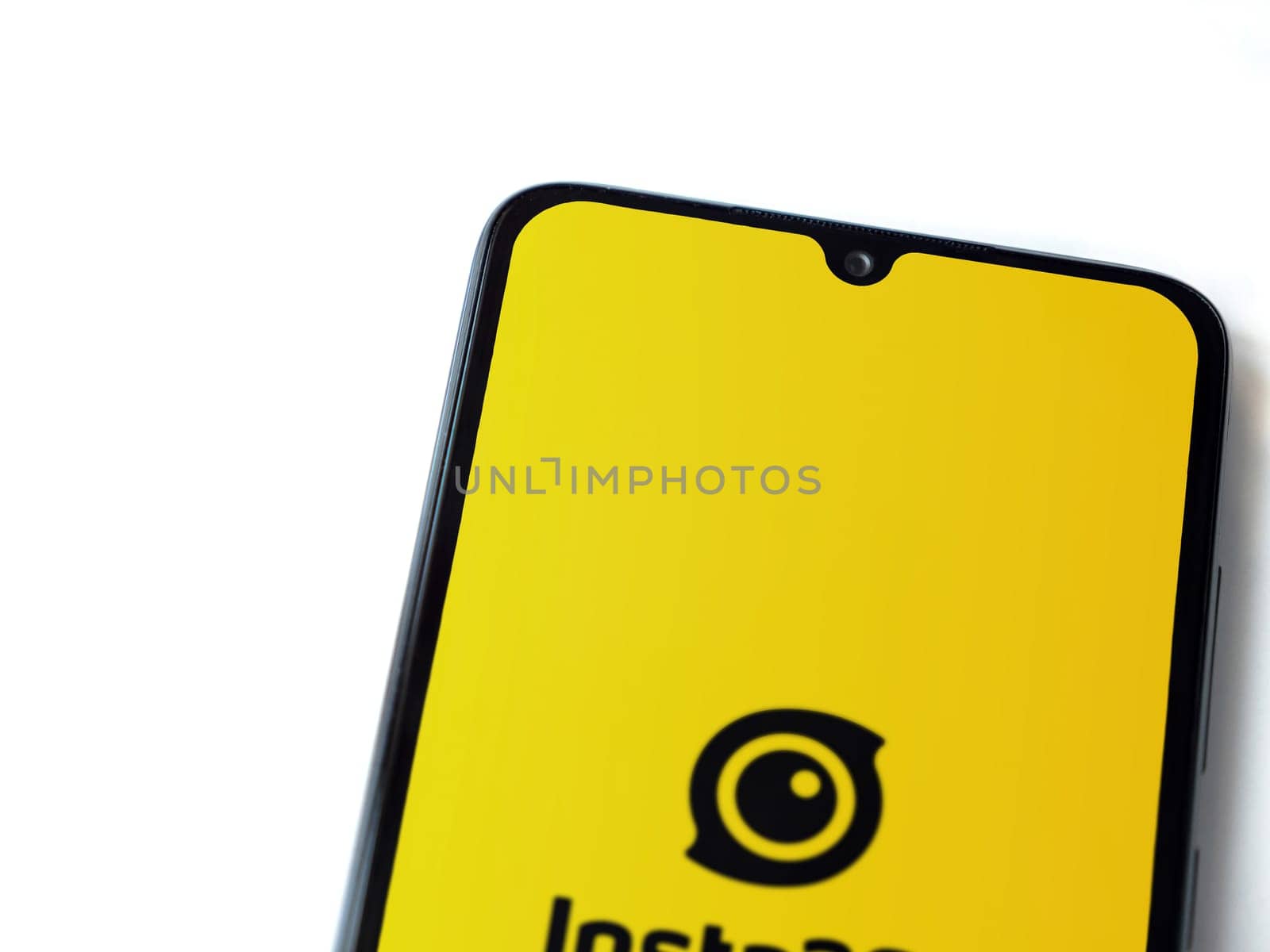 Lod, Israel - July 16,2023: Insta360 app launch screen on smartphone on white background.. Top view flat lay with copy space.