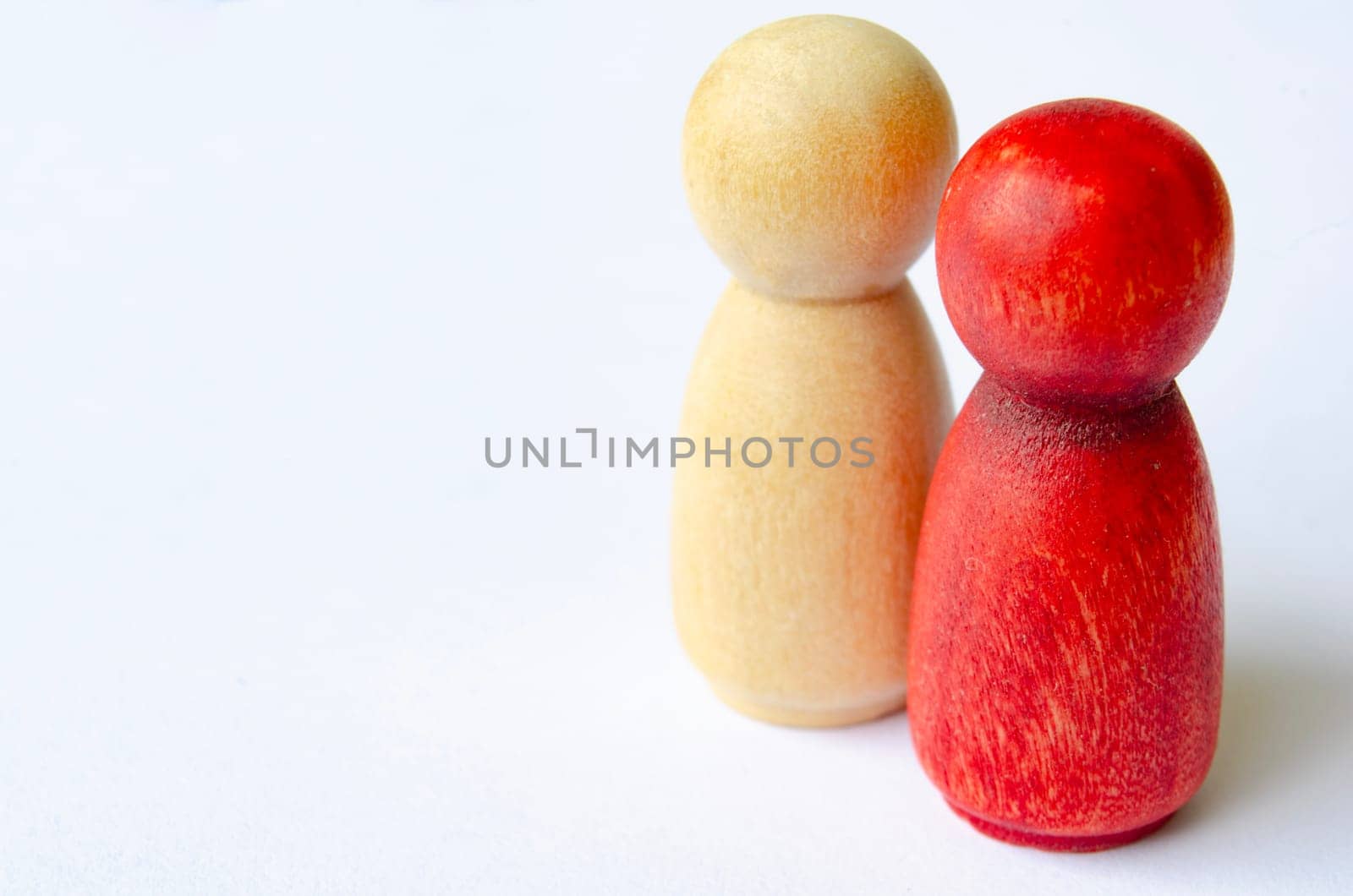Red and brown wooden figure on white cover background with customizable space for text.