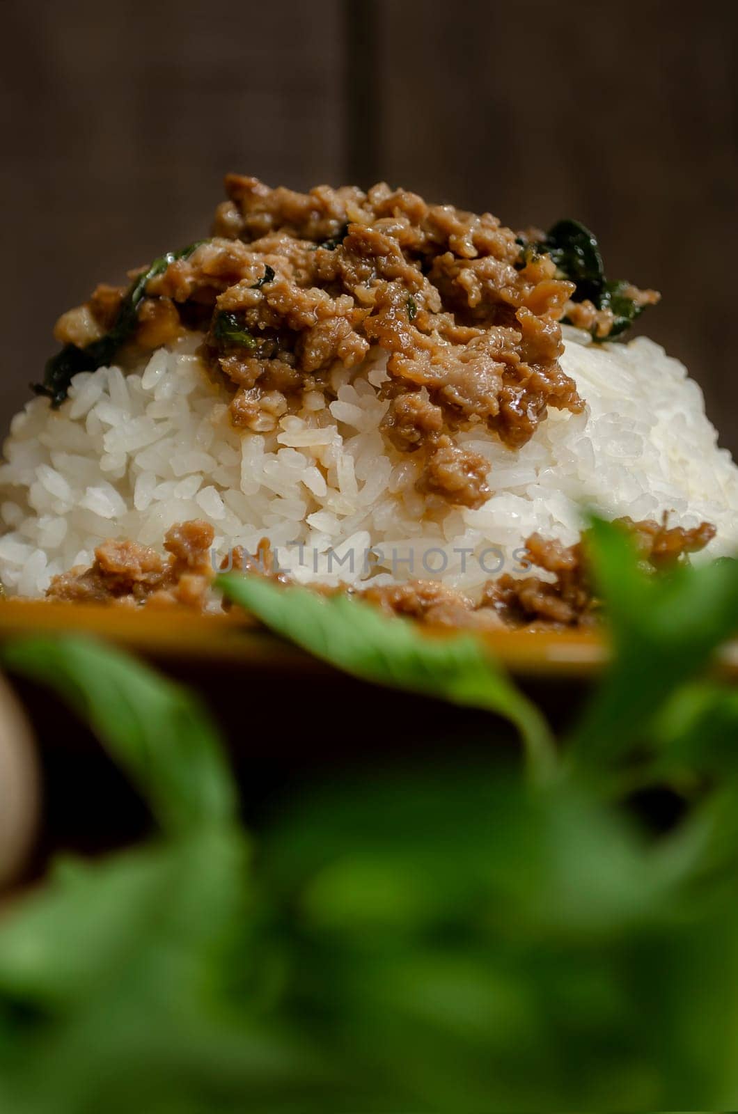 Minced pork with basil over rice is a Thai food that is popular among Thai people because it is delicious and easy to eat