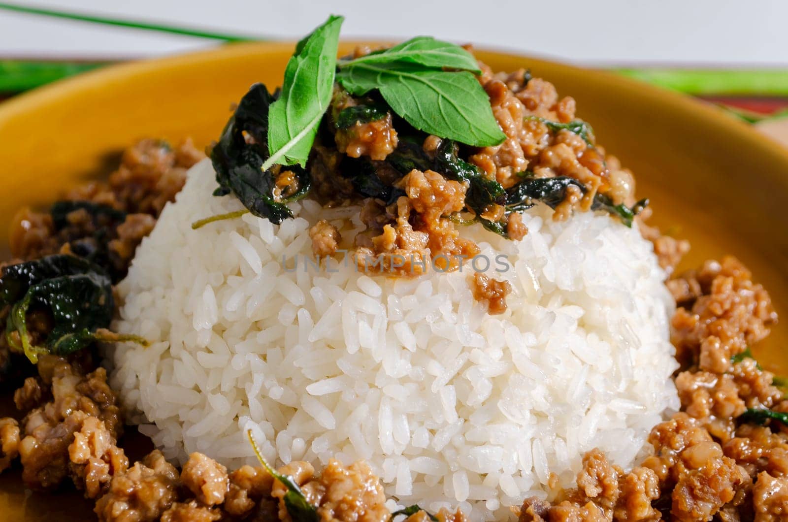 Minced pork with basil over rice is a Thai food that is popular among Thai people because it is delicious and easy to eat