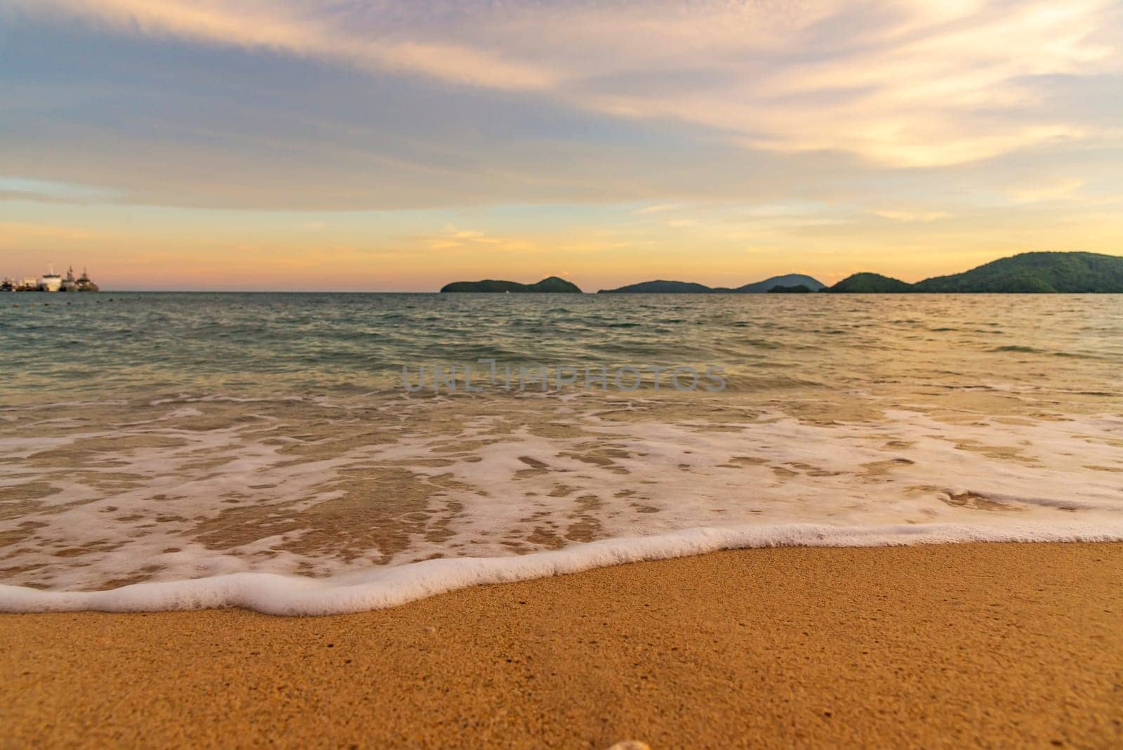 Beach sunset or sunrise with colorful of cloud sky and sunlight in evening light