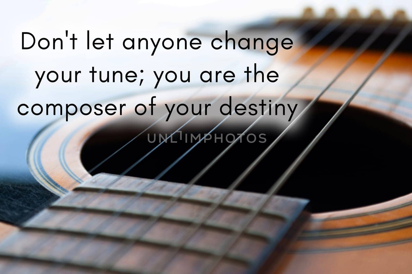 Motivational and inspirational quote - Don't let anyone change your tune  you are the composer of your destiny. With Guitar background