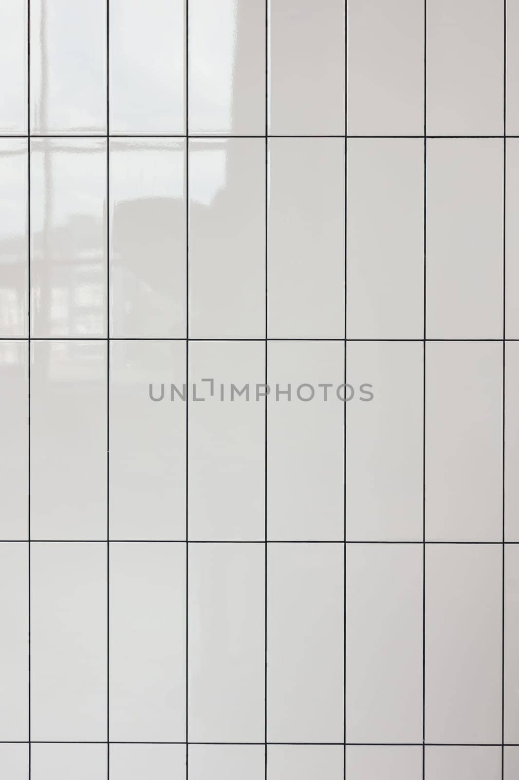 White glossy vertical ceramic rectangle tiles seamless pattern texture. Home interior, bathroom and kitchen wall repeat texture