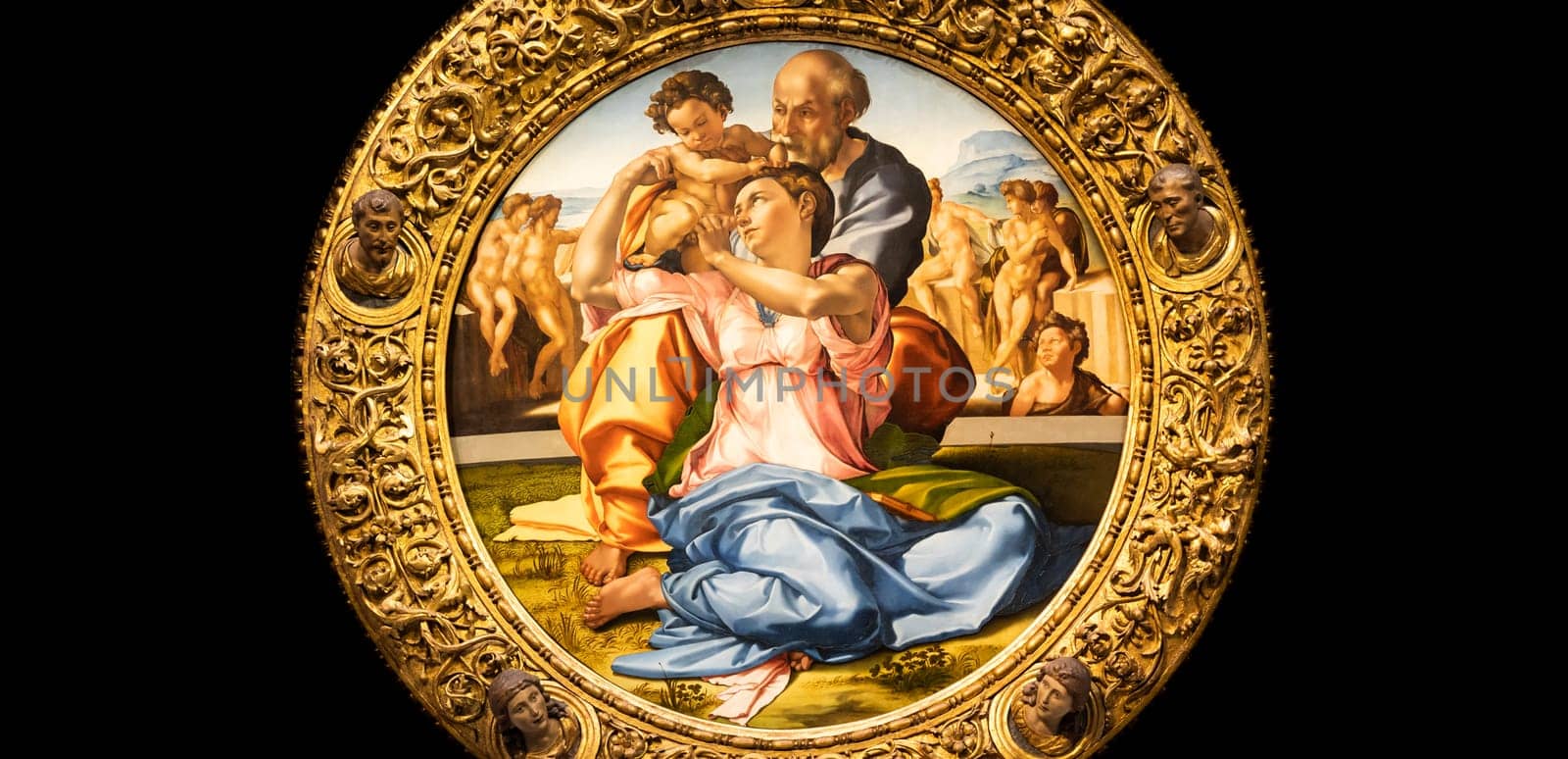 Florence, Italy - Circa August 2021: Holy Family with the Young St. John Baptist - named Doni Tondo - by Michelangelo Buonarroti, 1507