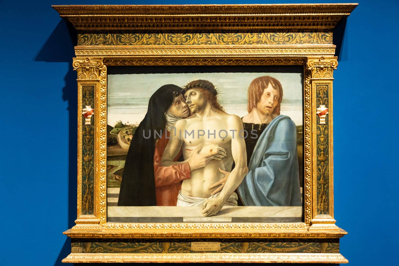 Milan, Italy - 23 September 2023: Brera antique painting museum. The pity, Pietà, by Giovanni Bellini, 1460