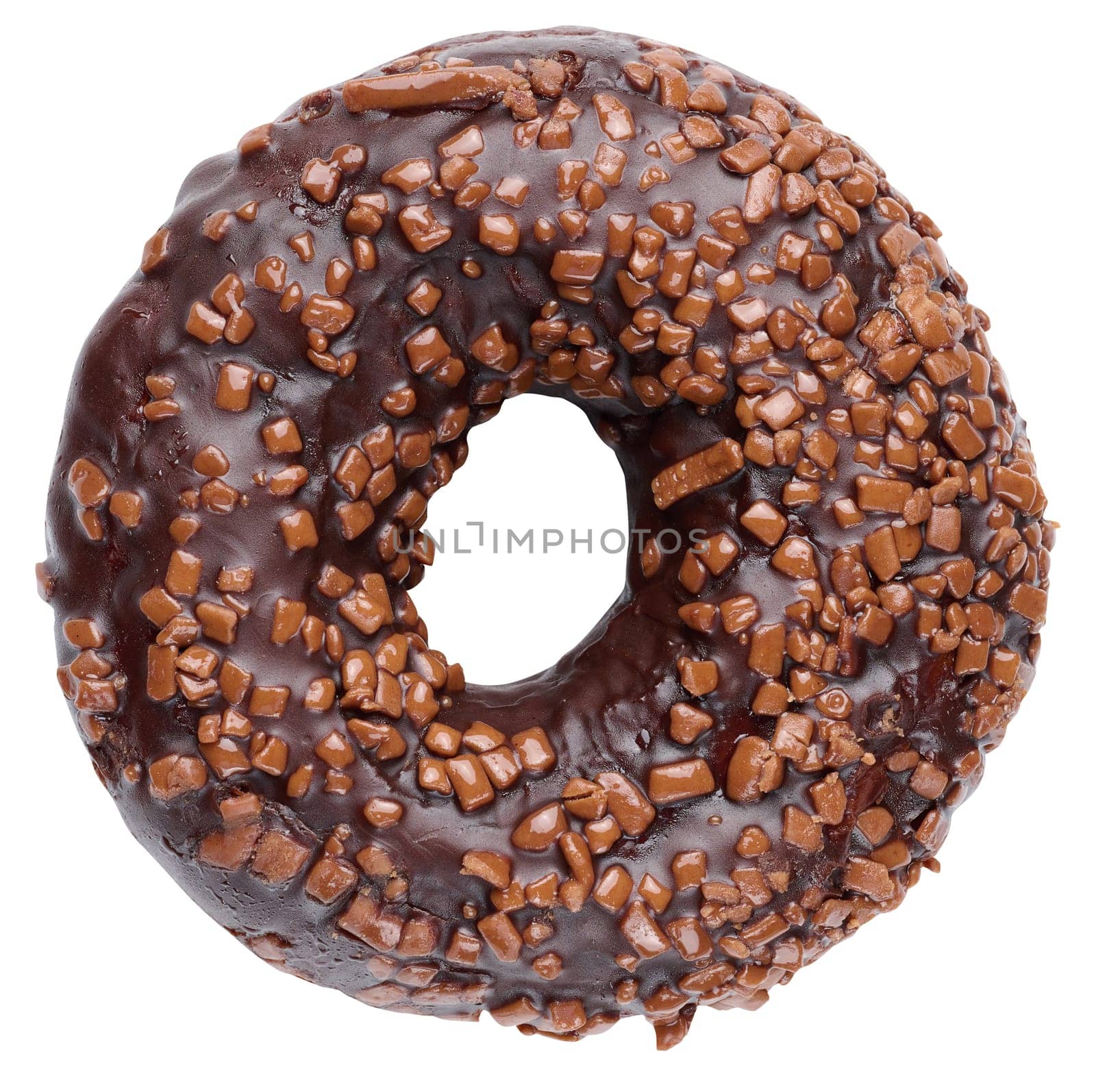 Donut sprinkled with crushed nuts and drizzled with chocolate on a white isolated background
