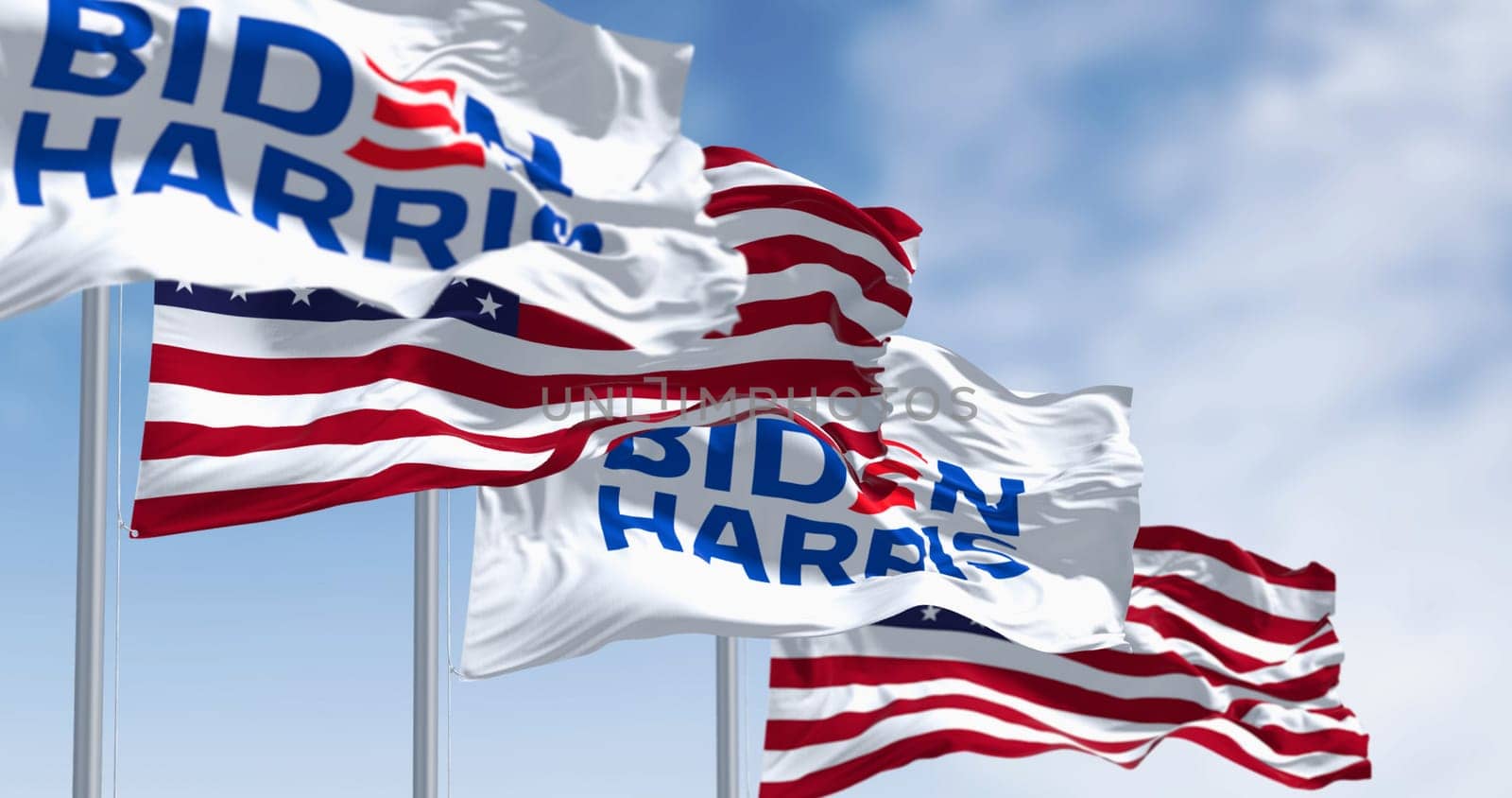 Washington D.C., US, June 20 2023: Biden Harris 2024 presidential campaign flag waving with the american flag. Illustrative editorial 3d illustration render. 2024 US presidential election