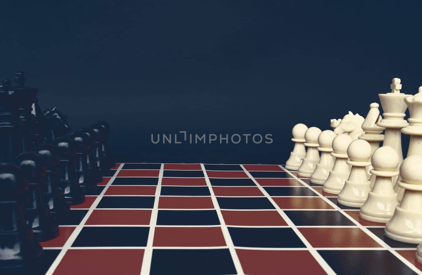 Selective view of chess pawn moving toward for battle. Strategy and tactic concept.