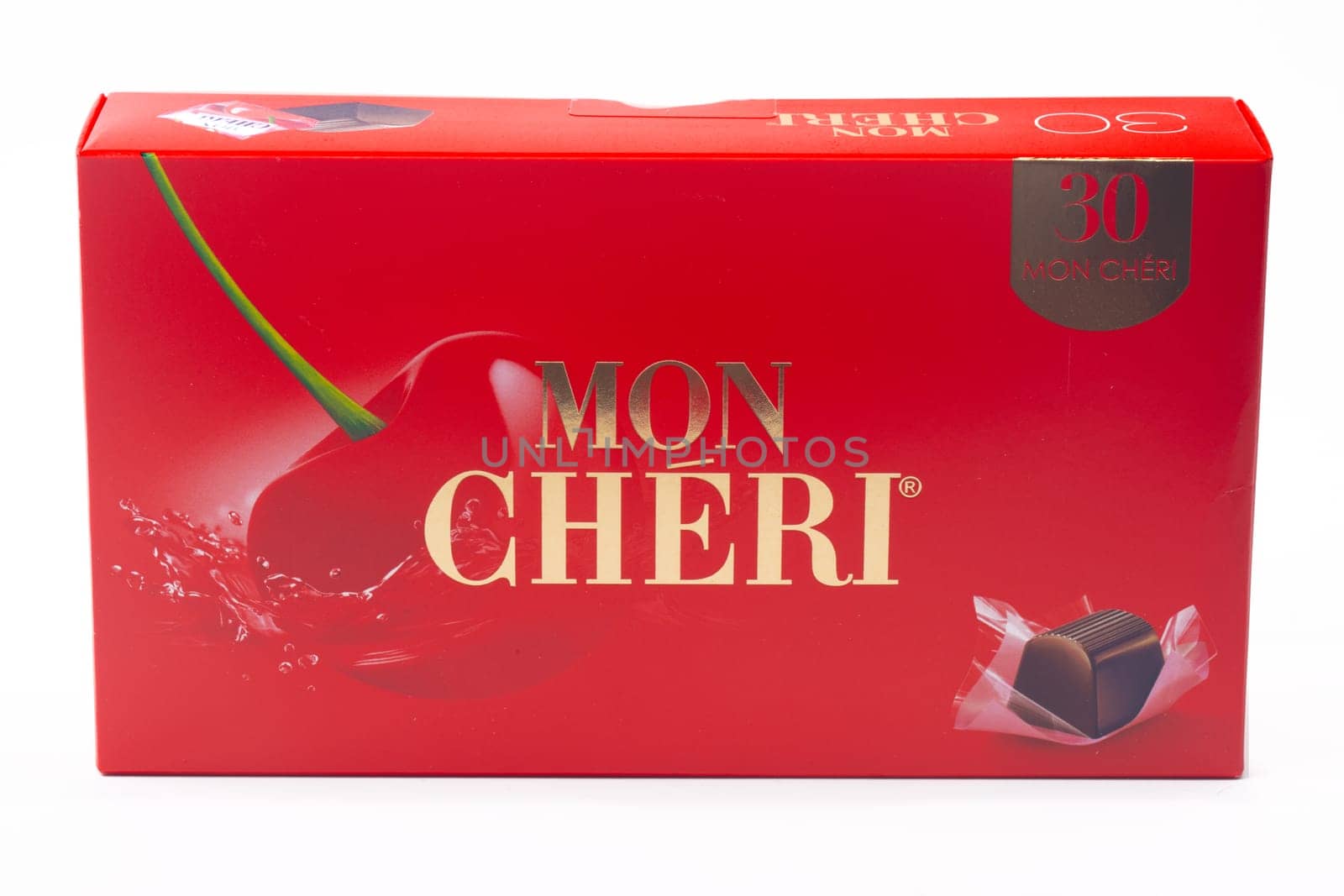 HUETTENBERG, GERMANY - SEPTEMBER 24 -2023: Box of Ferrero Mon Cheri chocolate pralines. Mon Cheri is an internationally known brand name of the Italian Ferrero company for a chocolate confectionery
