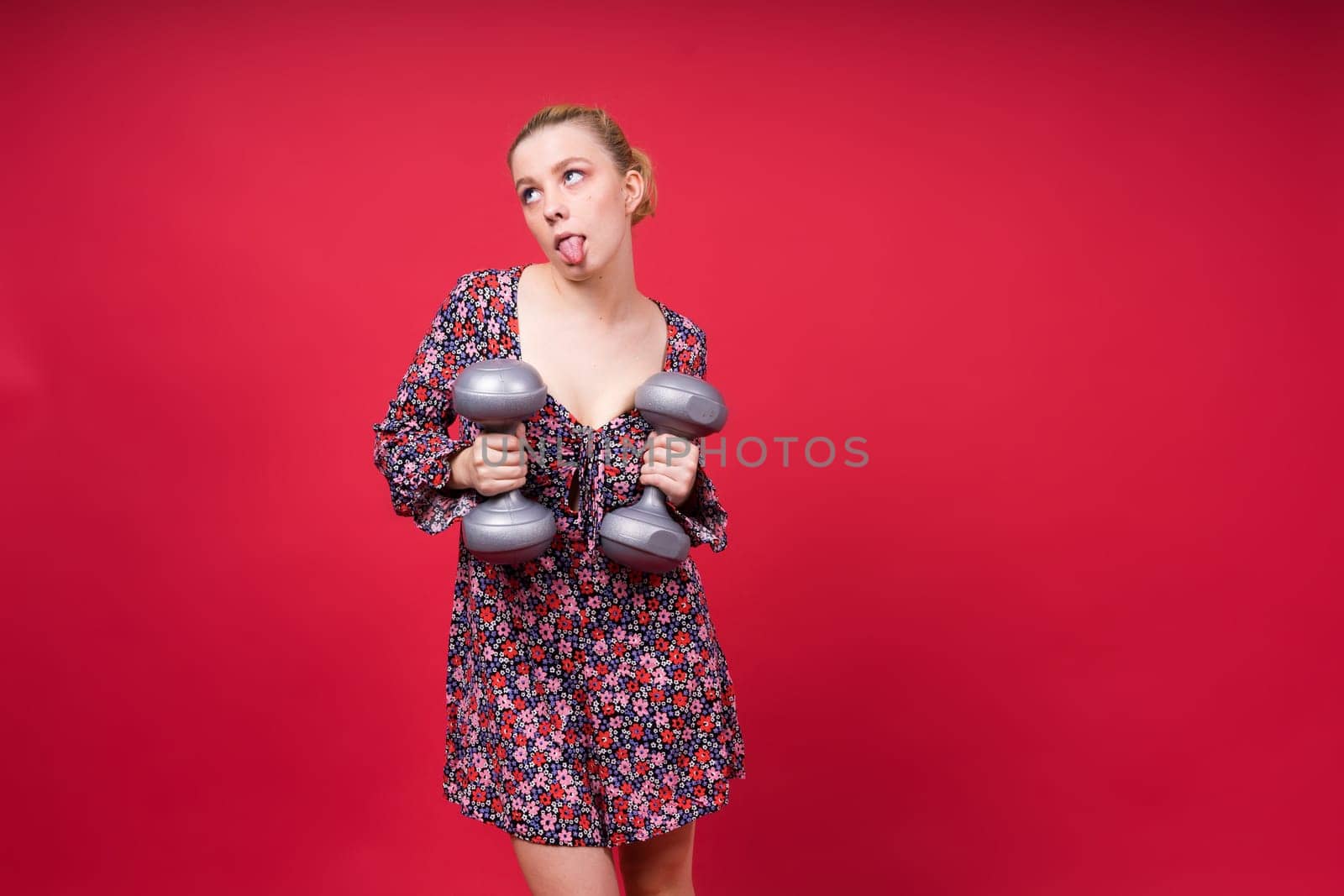 Boxer, seductive confident female boxer with gloves studio, sporty woman posing looking to camera.