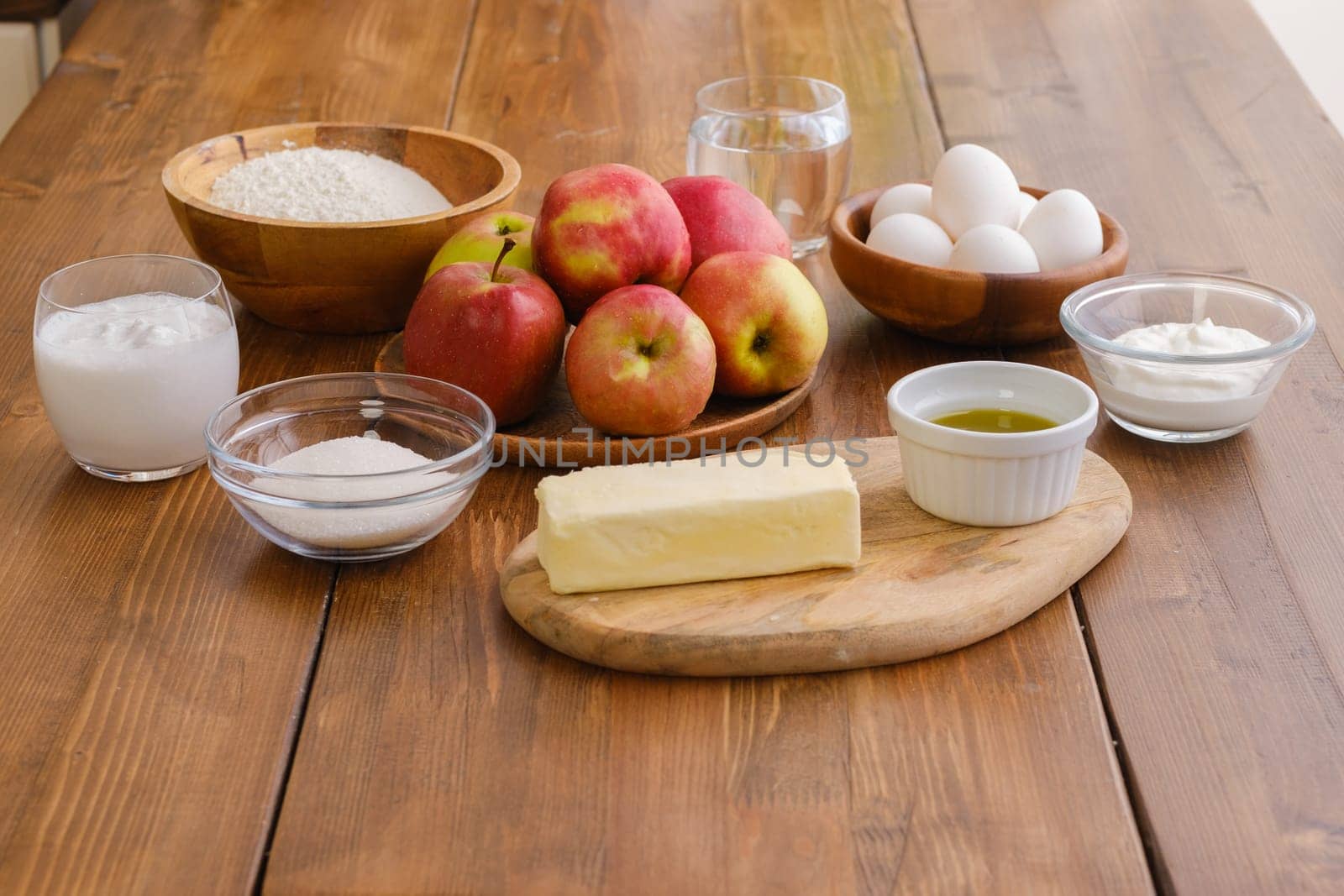 Overhead view of ingredients for apple pancakes on a table