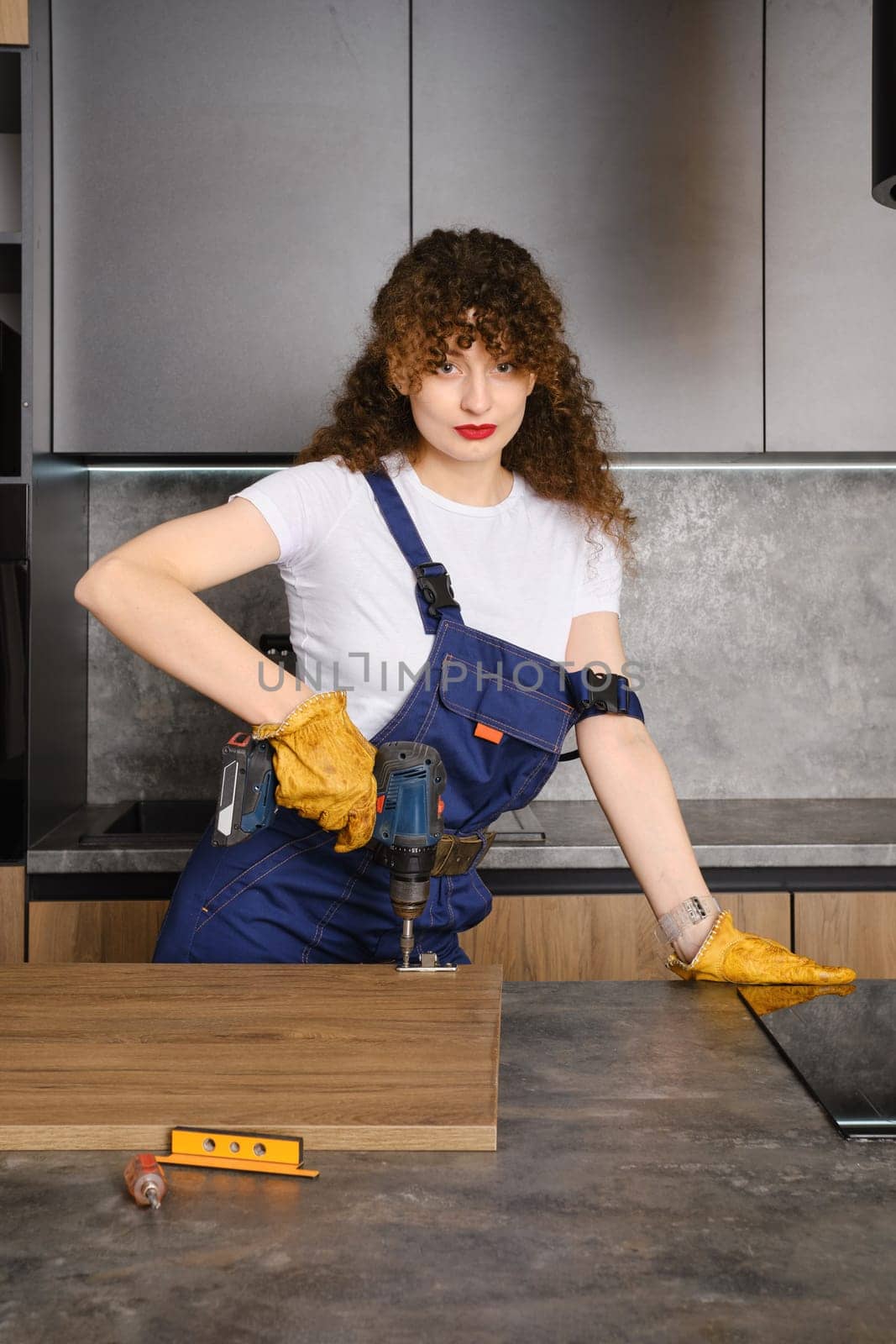 Portrait of beautiful woman with professional work tool equipment