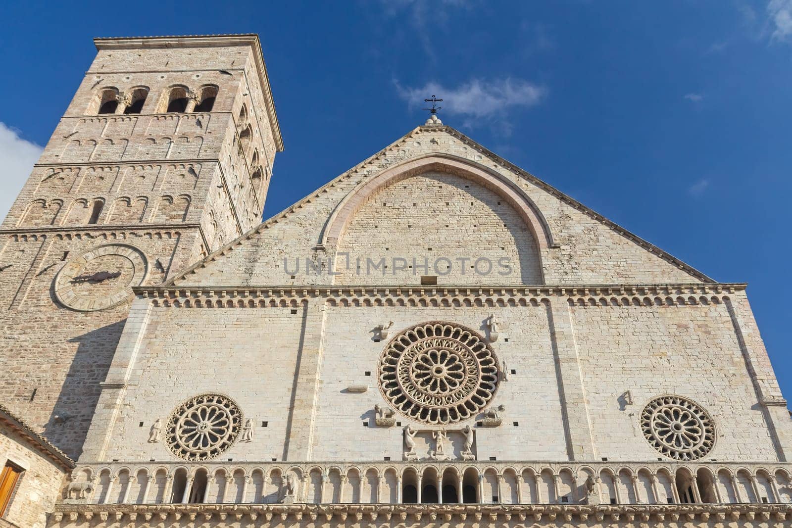 Front detailed  view of Cathedral of San Rufino. in italian Assisi. Umbria. Horizontally.