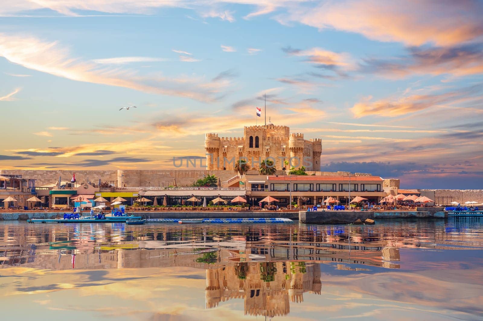 View of the Citadel of Qaitbay and beautiful Mediterranean sea coast in Alexandria, Egypt.