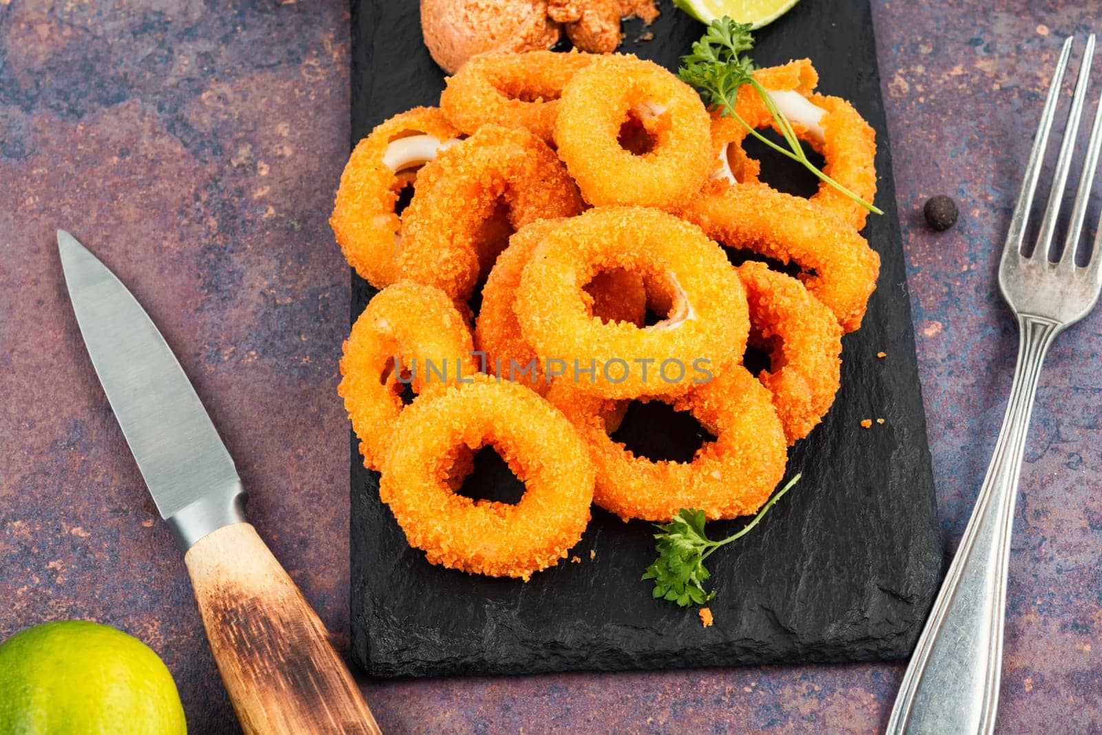 Deep fried calamari or squid rings. Unhealthy food