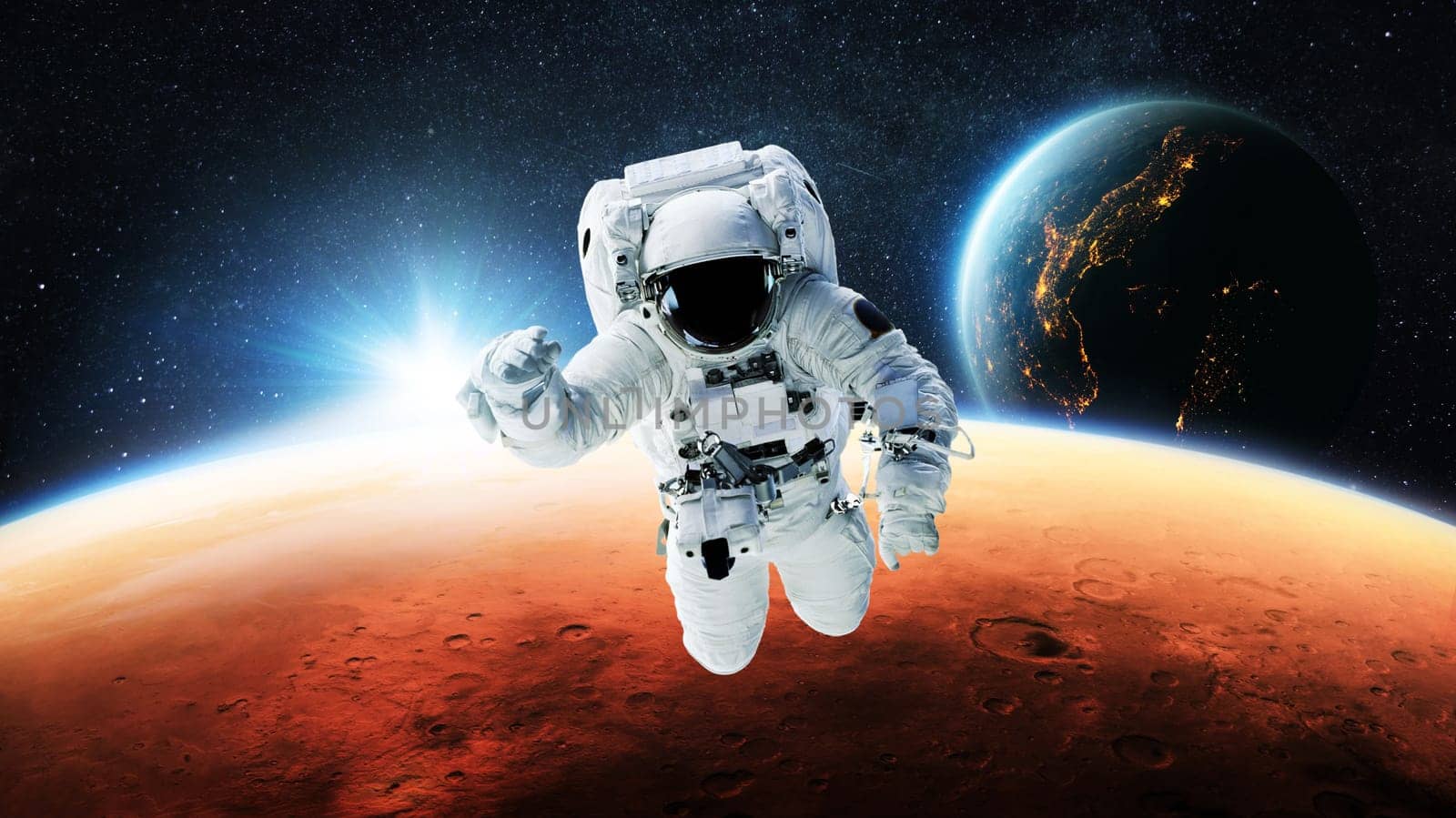 Space man astronaut flies in open space near red planet Mars with blue planet Earth at sunset. High quality space wallpapers. New space mission. Space exploration