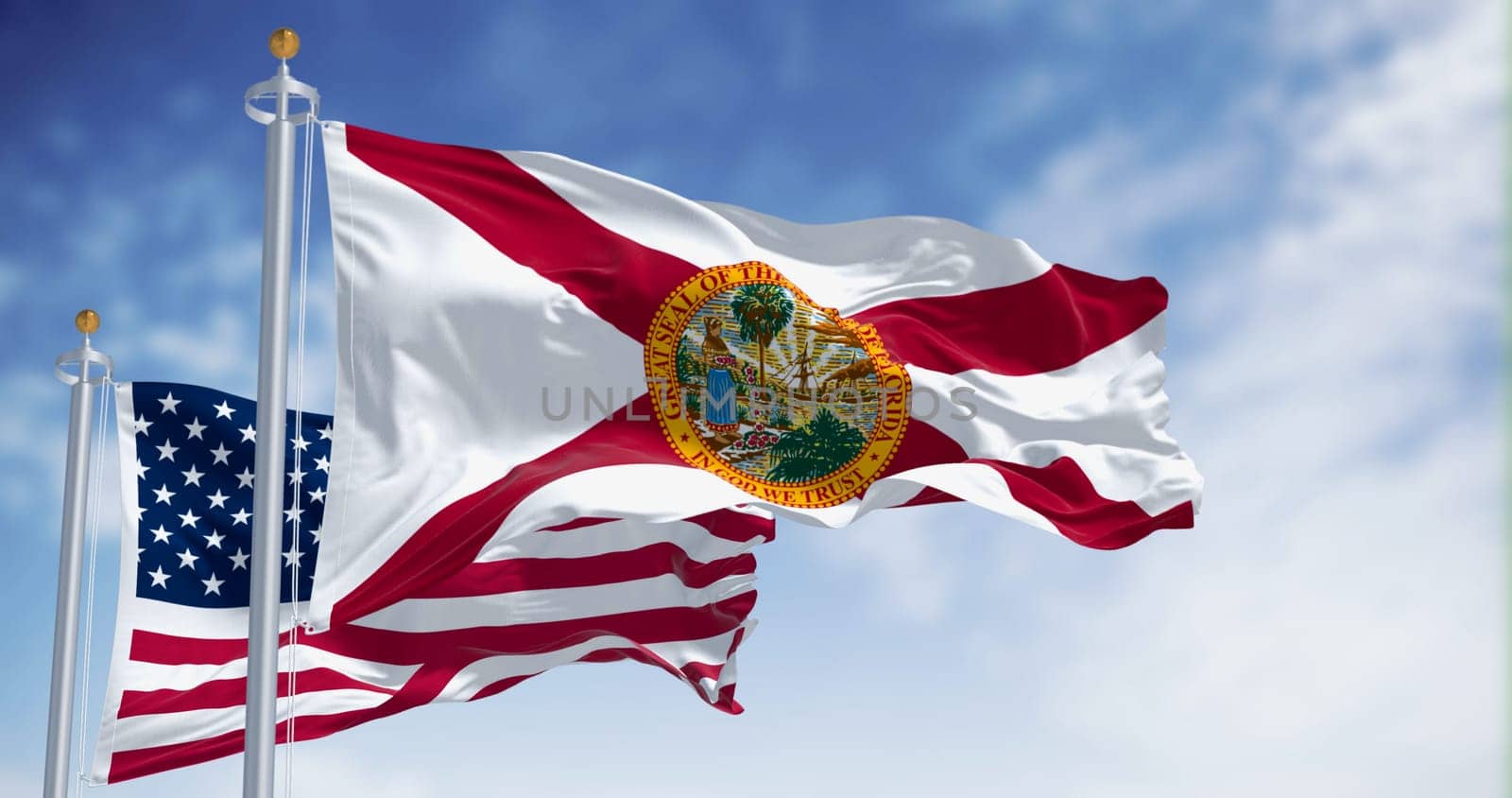 Flags of Florida and United States waving in the wind on a clear day. US state flag. Pride and patriotism concept. 3d illustration render. Fluttering textile
