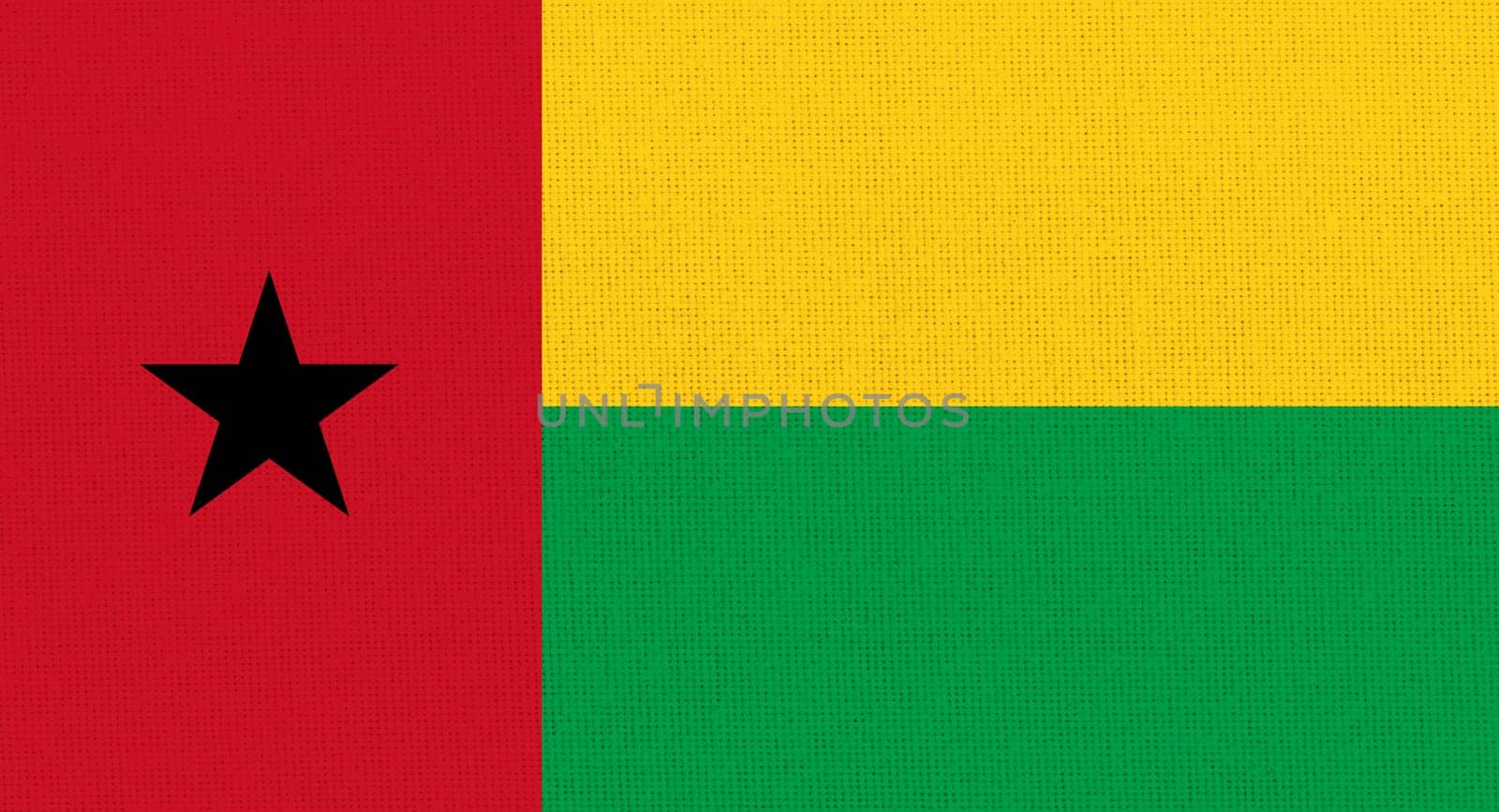 flag of Guinea-Bissau. National Guinea-Bissau flag on fabric surface. Guinea-Bissau national flag on textured background. Fabric Texture. African country