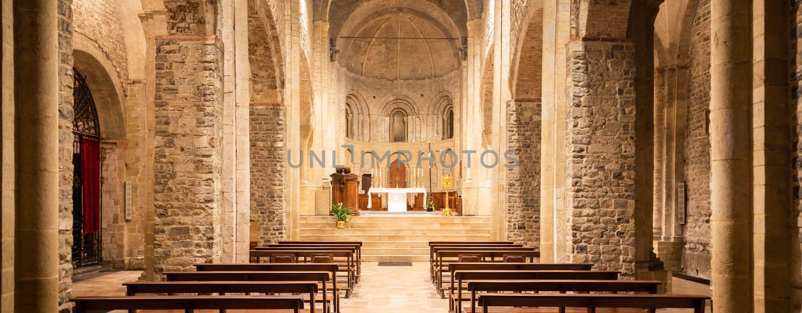 Ventimiglia - Italy - Interior of Romanic catholic cathedral with altar, 11th century