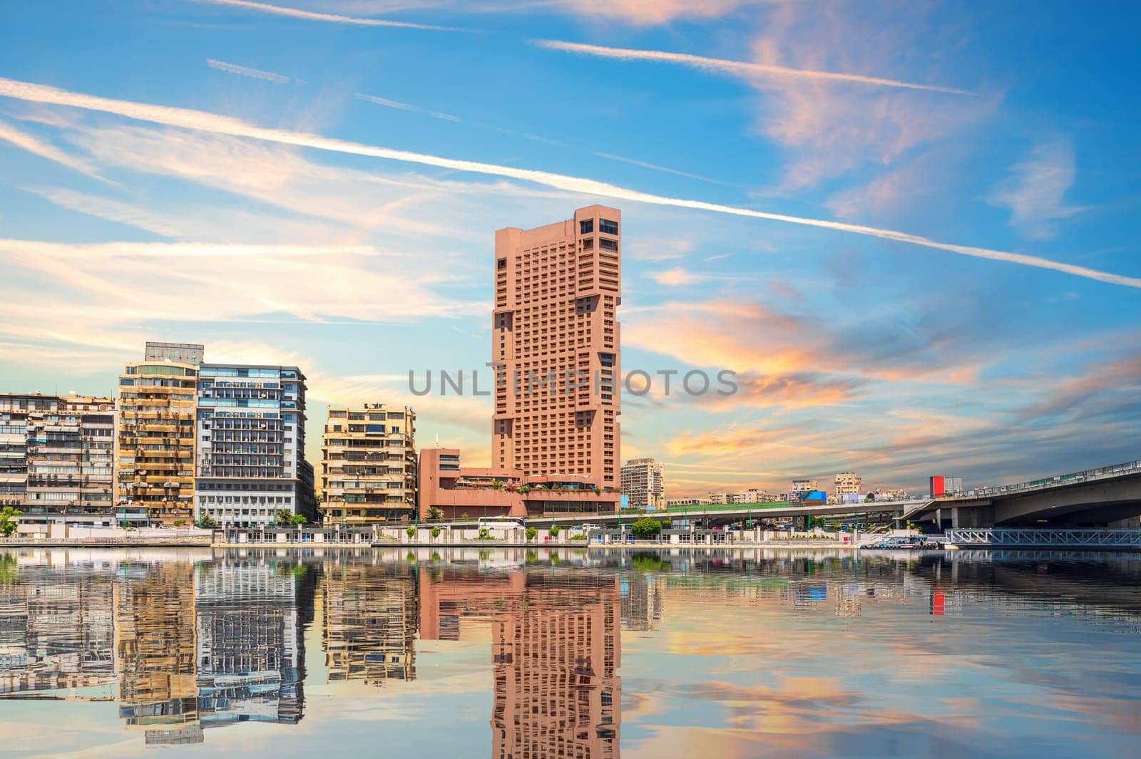 Modern view of Cairo buildings near the bridge over the Nile, Egypt.