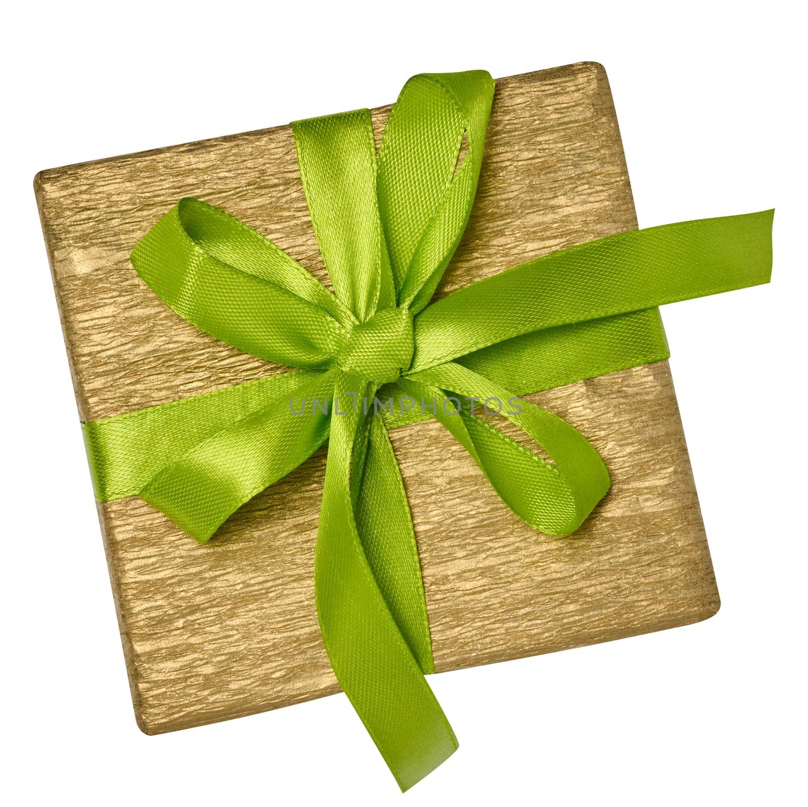 Box is wrapped in yellow gift wrapping and green ribbon on a white isolated background, top view