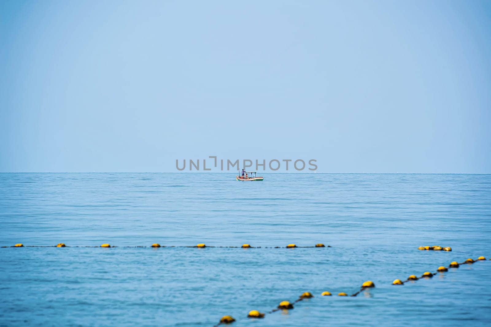 Boat floating in the sea on a good day.
