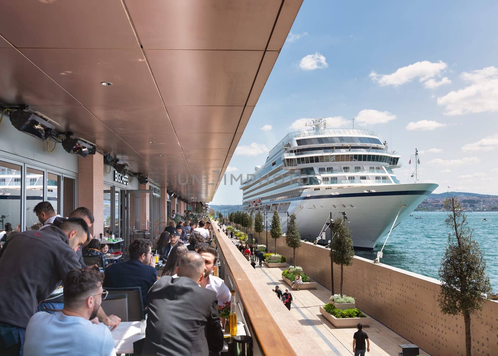 Istanbul, Turkey - May 13, 2023: MV Viking Sky, Large cruise ship docked at terminal of Galataport, a mixed use development located along shore of Bosphorus strait, in Karakoy neighbourhood