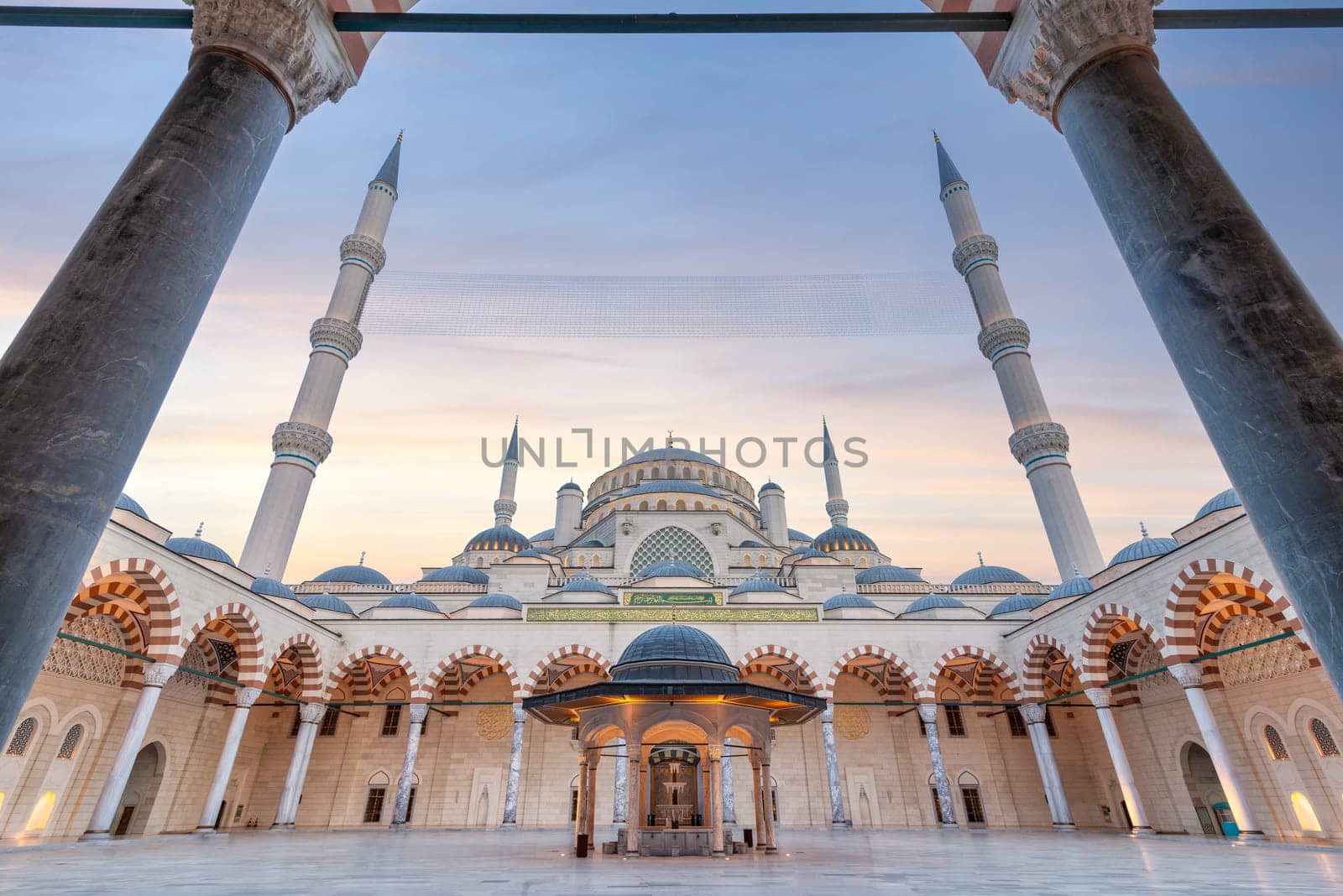 Sunset shot of Courtyard of Grand Camlia Mosque, or Buyuk Camlica Camii, a modern Islamic complex, built in 2019, located in Camlica hill in Uskudar district, Istanbul, Turkey