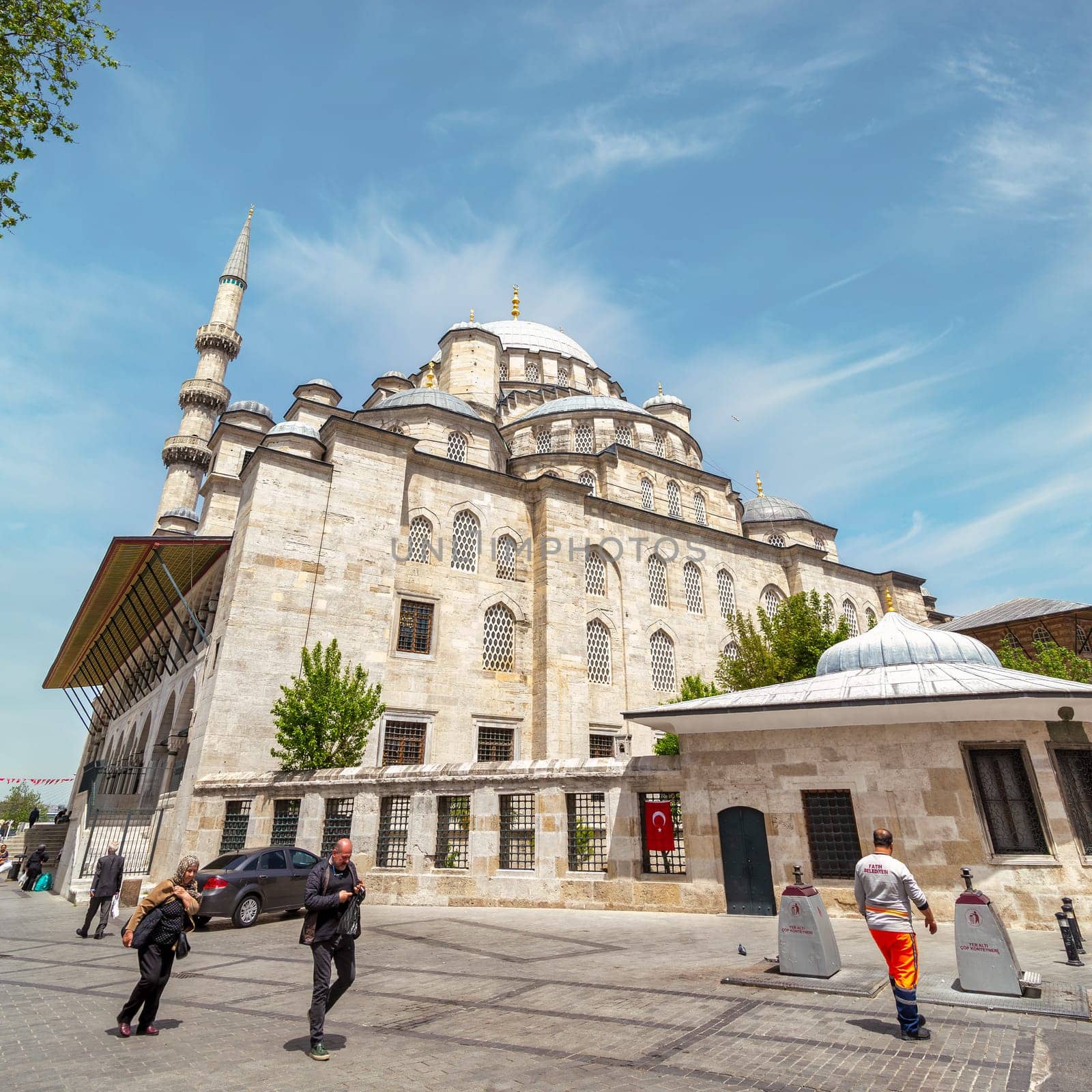 Istanbul, Turkey - May 16 2023: New Mosque, or Yeni Cami, an Ottoman imperial mosque built by Safiye Sultan, wife of Sultan Murad III in 1597, situated on the Golden Horn, near Galata Bridge, Eminonu