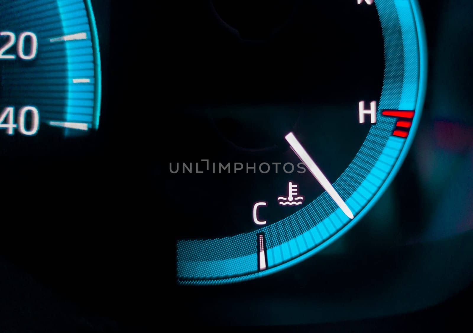 Car temperature gauge closeup. Digital car dashboard indicators