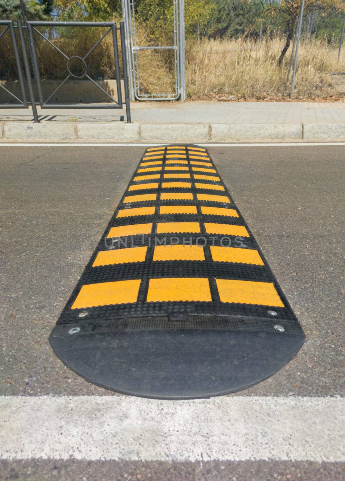 Speed bumps installed at urban area. Visible sideway