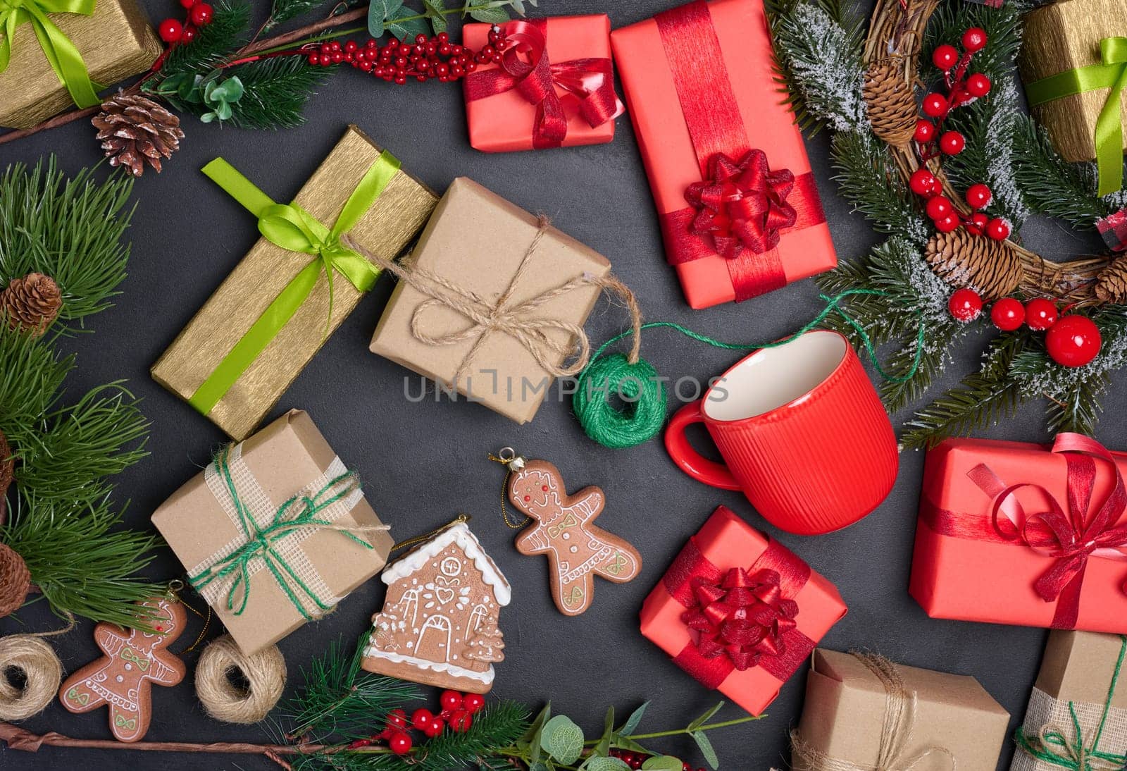 Christmas decor, gift red boxes on a black background, top view