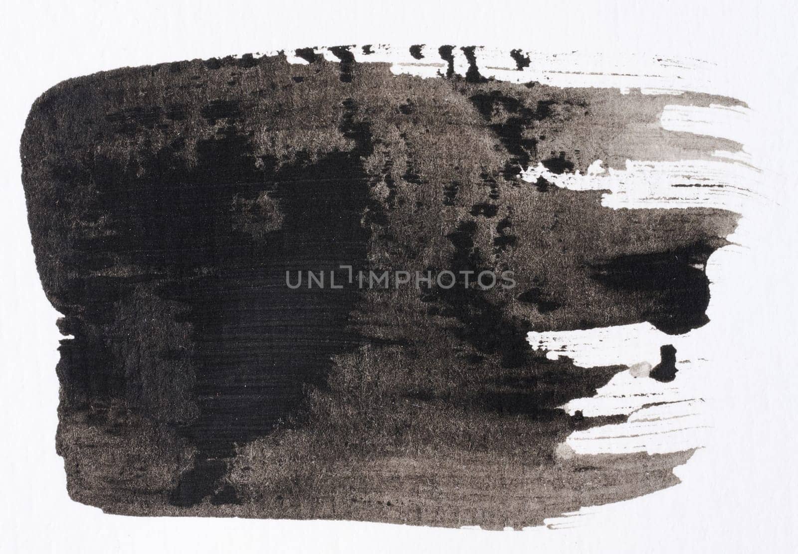 Watercolor brush stroke of black paint, on a white background
