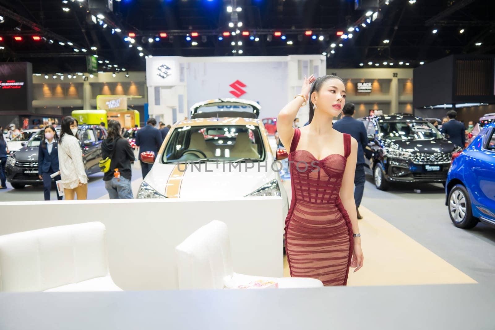 Nonthaburi, Thailand - APR 2, 2023 Unidentified model poses with a car at The 44th Bangkok international motor show 2023 at IMPACT Arena, Muang Thong Thani, Nonthaburi, Thailand.