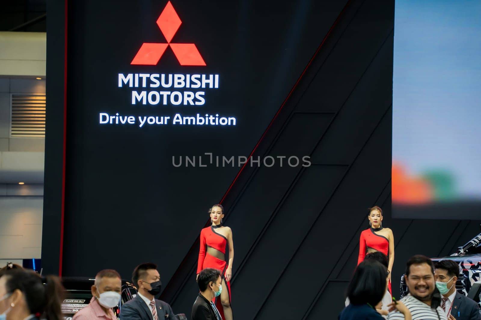 Nonthaburi, Thailand - APR 2, 2023 Unidentified model poses with a car at The 44th Bangkok international motor show 2023 at IMPACT Arena, Muang Thong Thani, Nonthaburi, Thailand.