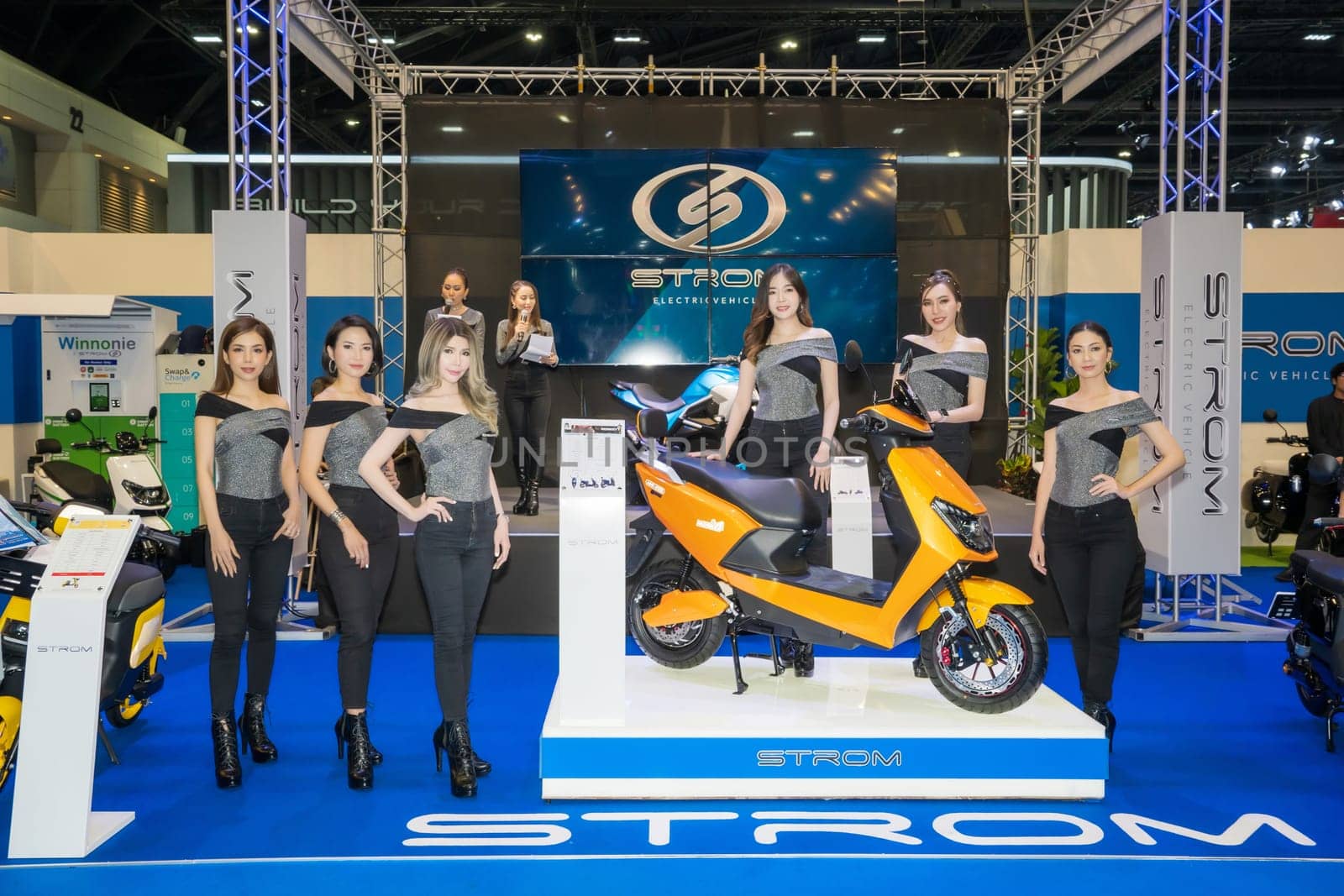 Nonthaburi, Thailand - APR 2, 2023 Unidentified model poses with a car at The 44th Bangkok international motor show 2023 at IMPACT Arena, Muang Thong Thani, Nonthaburi, Thailand.