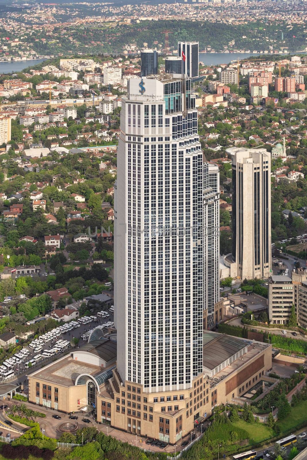 Aerial shot of Headquarters of Isbank commercial bank of Turkey located in the Levent district of Istanbul, Turkey, with Bosphorus Strait in the far end. Photo taken from Istanbul Sapphire