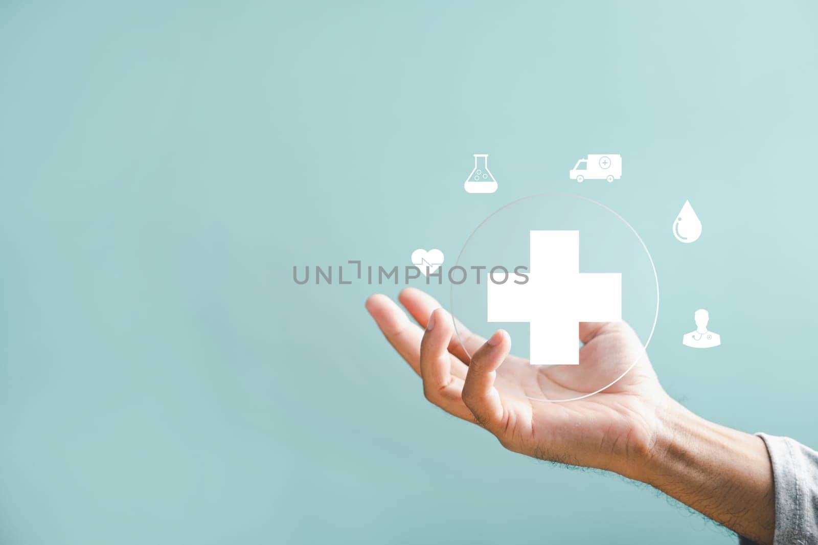 A hand holds a plus icon for medical care, indicating advantages. Health insurance health concept featuring access to welfare health and room for content.