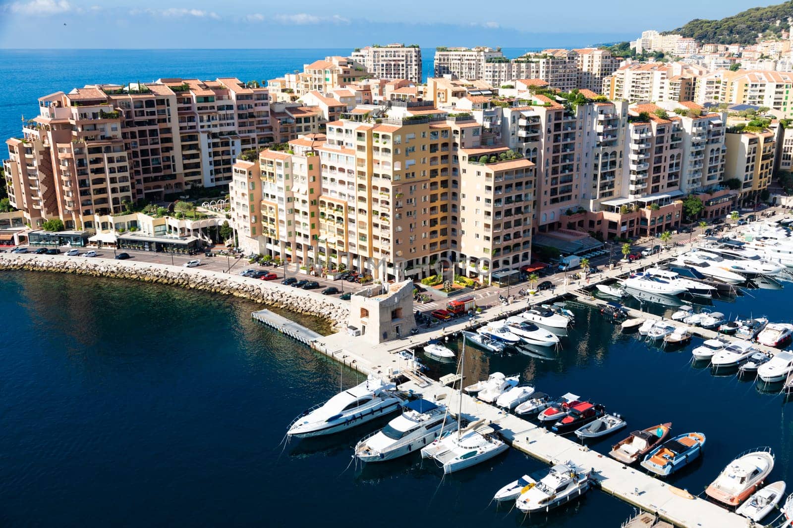 Montecarlo, Monaco - August 2022: panoramic view of the Fontvielle port with blue sky and sea