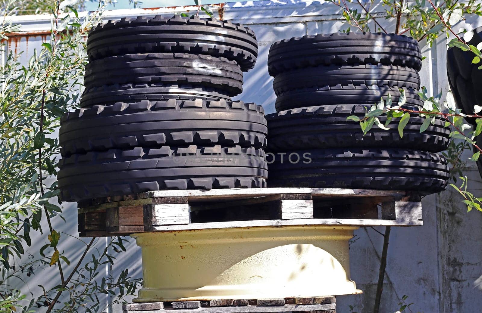 Old truck and car tires on a high pile