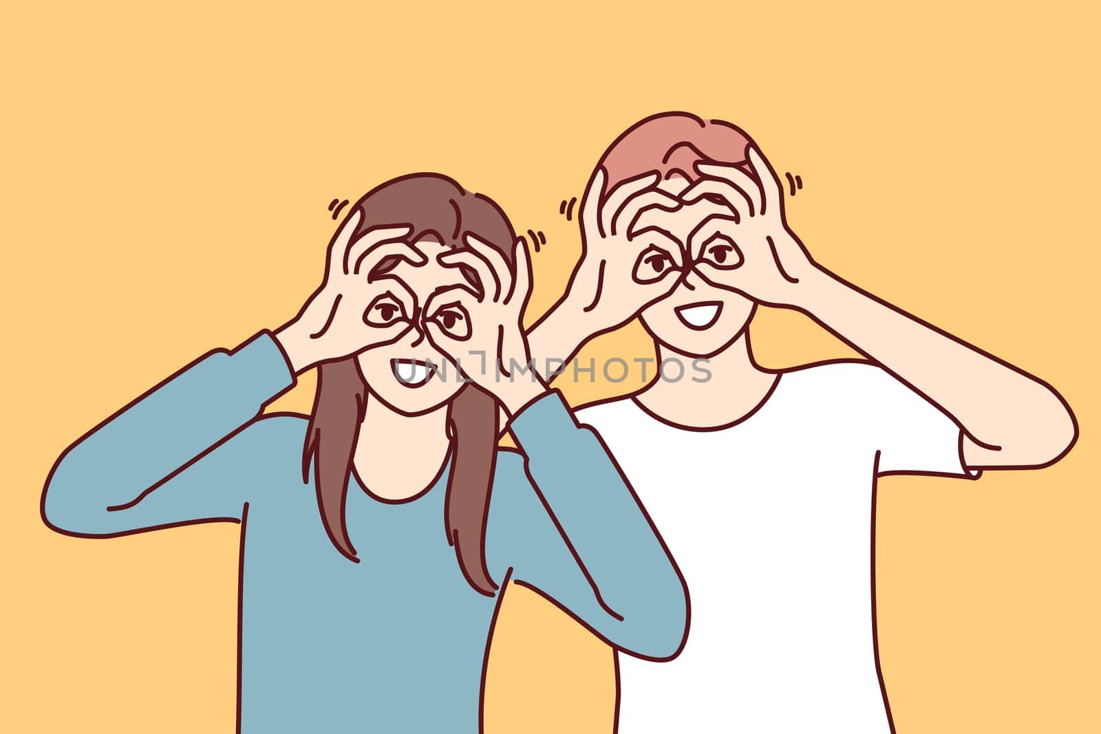 Funny man and woman make binoculars from fingers and look at screen smiling to cheer themselves up or friends. Funny guy and girl bring hands to eyes, demonstrating glasses gesture