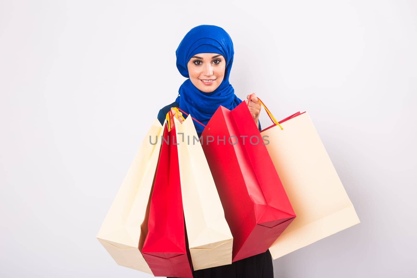 Arab Women with shopping bag in studio