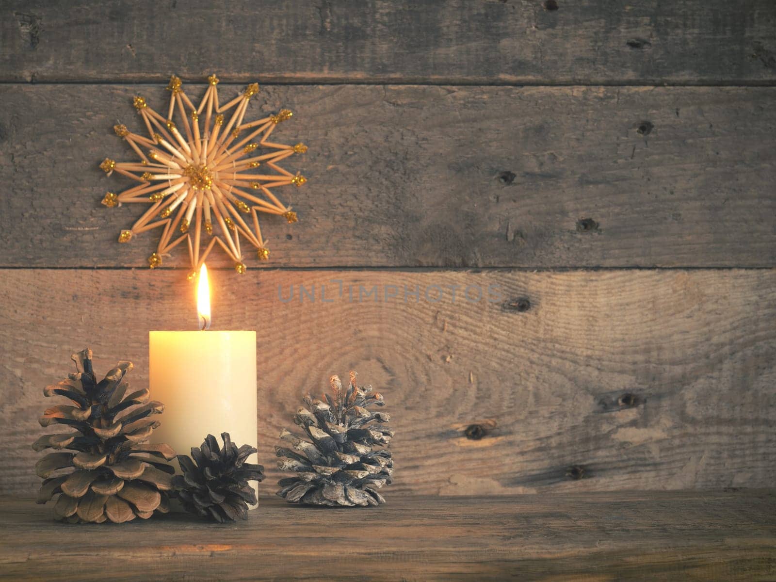 First Advent candle burns, one Advent candle burns, Christmas concept background