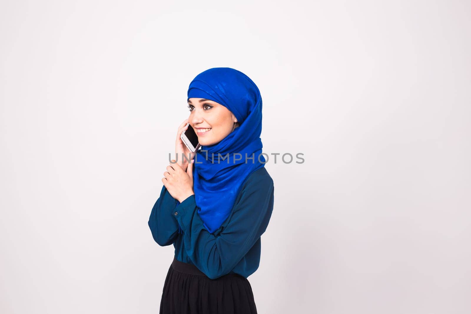 beautiful young arabian woman talking on cell phone