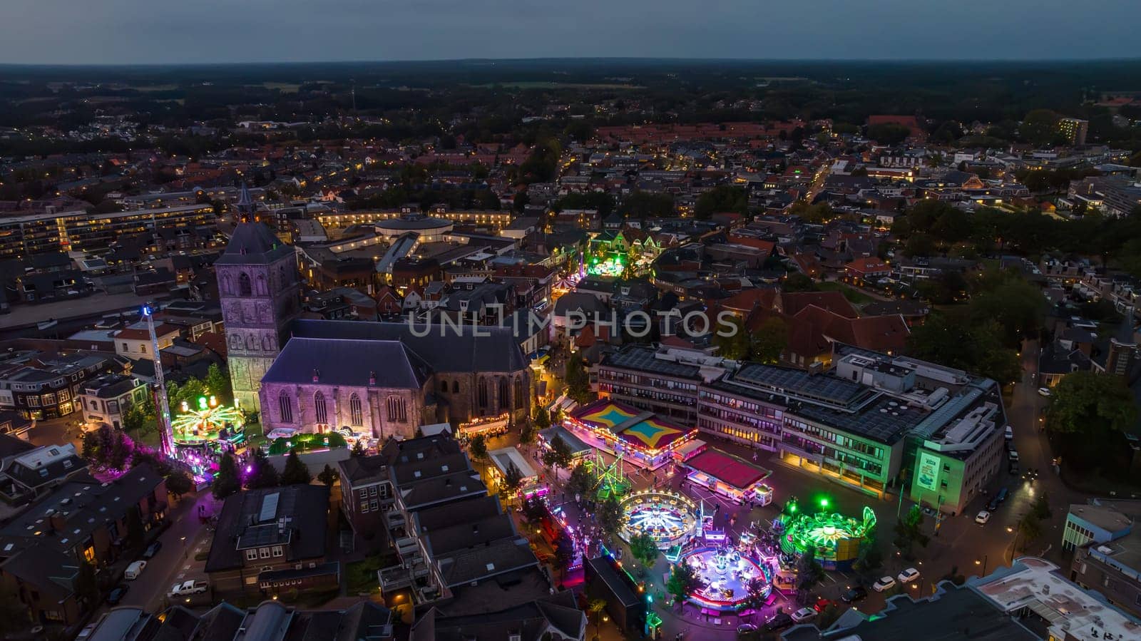 OLDENZAAL, NETHERLANDS - SEPTEMBER 30, 2023: Aerial evening view of the annual fair in the city center